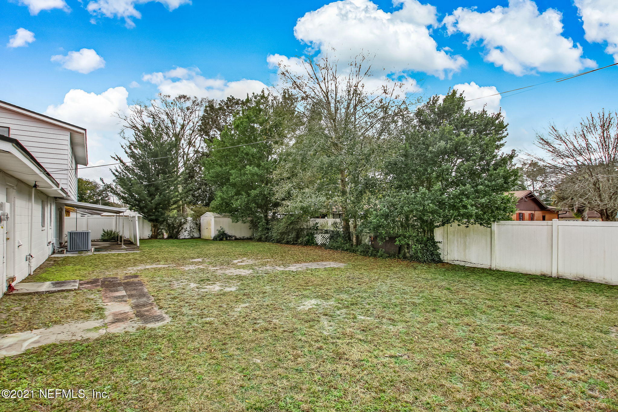 8290 Barracuda Road Jacksonville, FL 32244 - Photo 35 of 41 a view of a big yard with large trees