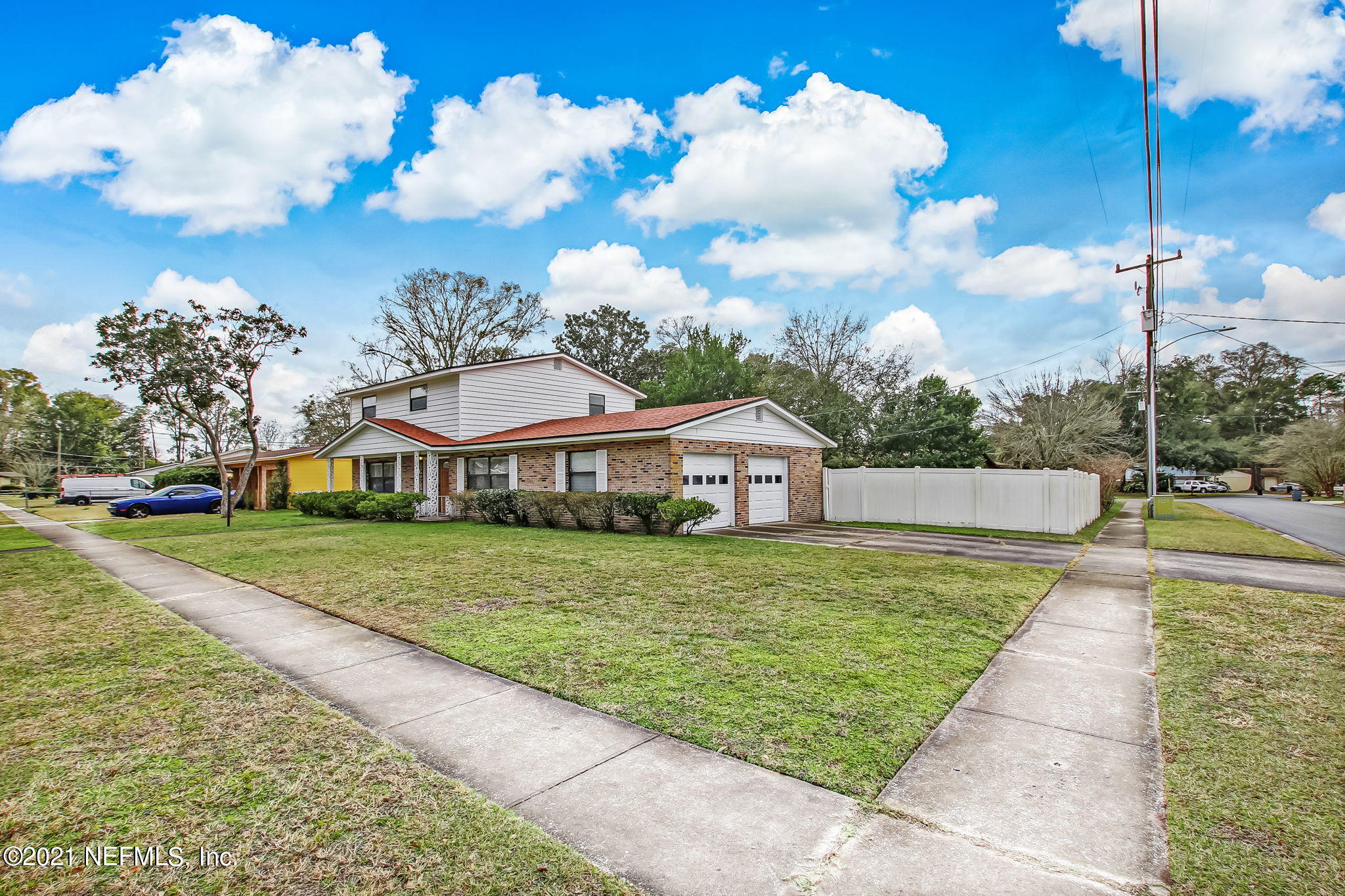 8290 Barracuda Road Jacksonville, FL 32244 - Photo 5 of 41 a front view of a house with garden