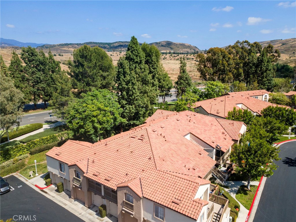 215 South Cross Creek Road, Unit L Orange, CA 92869 - Photo 32 of 50 a view of a houses with a outdoor space