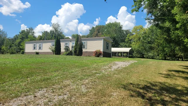 a house view with a garden space