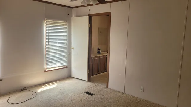 a view of a room with a window