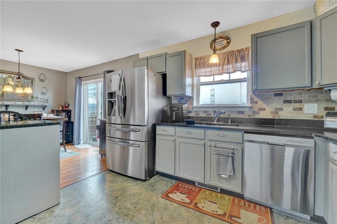 39 Helene Road Warwick, NY 10990 - Photo 1 of 1 a kitchen with stainless steel appliances granite countertop a refrigerator a stove a sink and a white cabinets