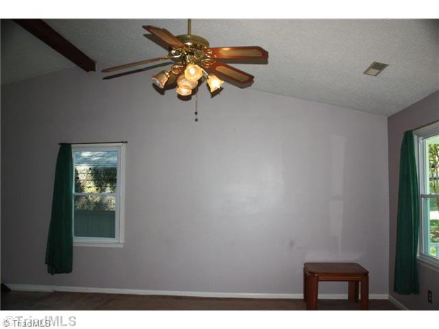 5501 Salem View Road Pfafftown, NC 27040 - Photo 4 of 13 Den/Family/Great Room. Vaulted Ceiling w/ Exposed Wood Beam
