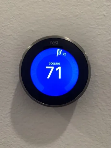 a view of a room with a wooden floor