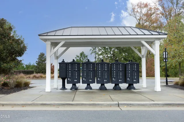 an aerial view of houses with yard