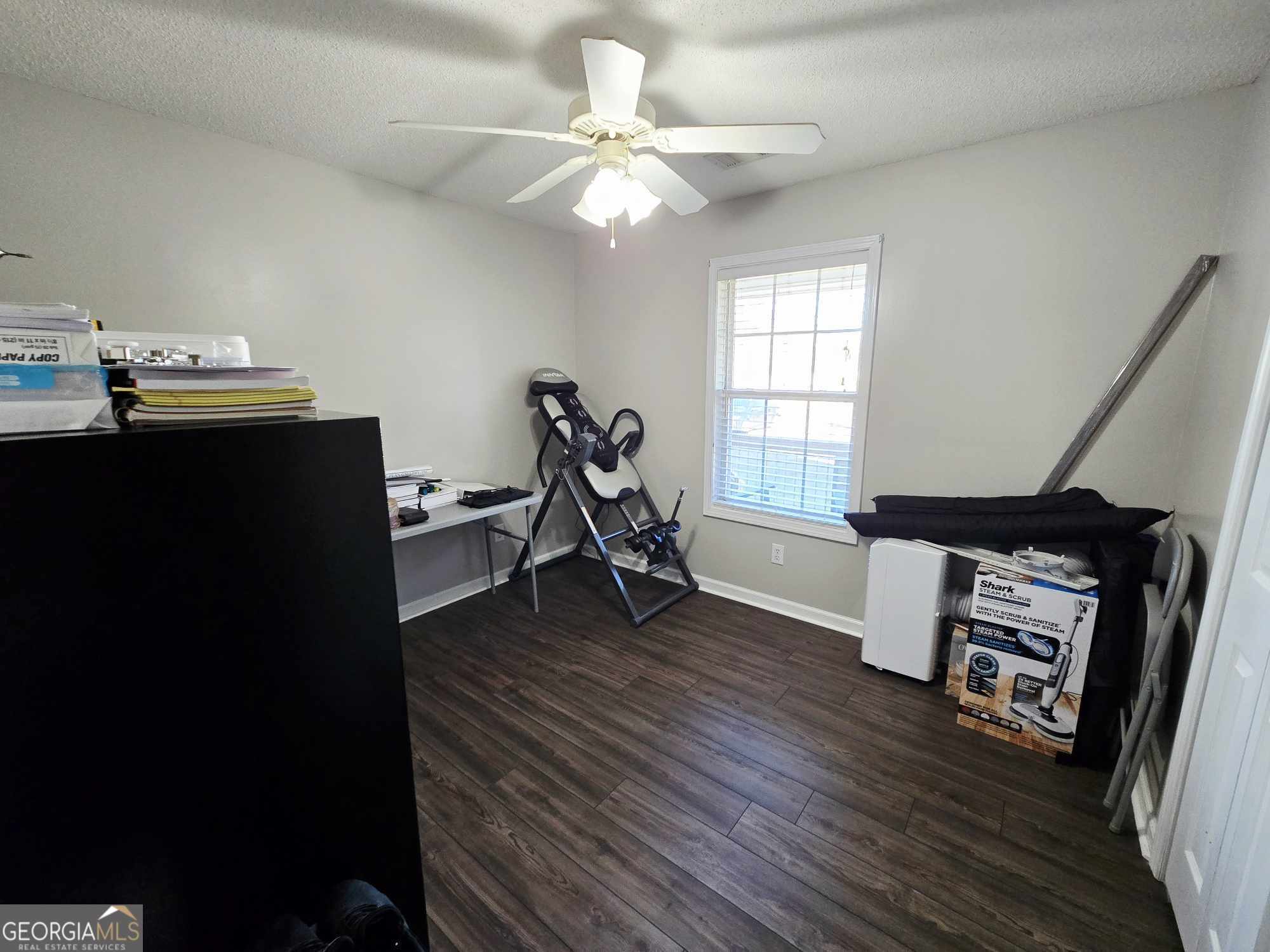 10 Shannons Lane Comer, GA 30629 - Photo 31 of 50 a living room with furniture and a wooden floor