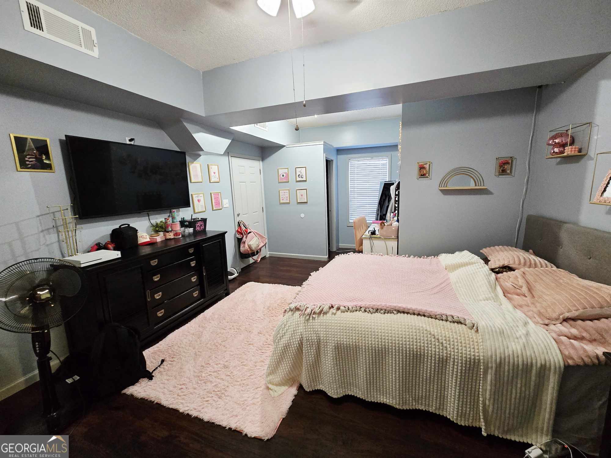 10 Shannons Lane Comer, GA 30629 - Photo 42 of 50 a bed room with a bed and a television