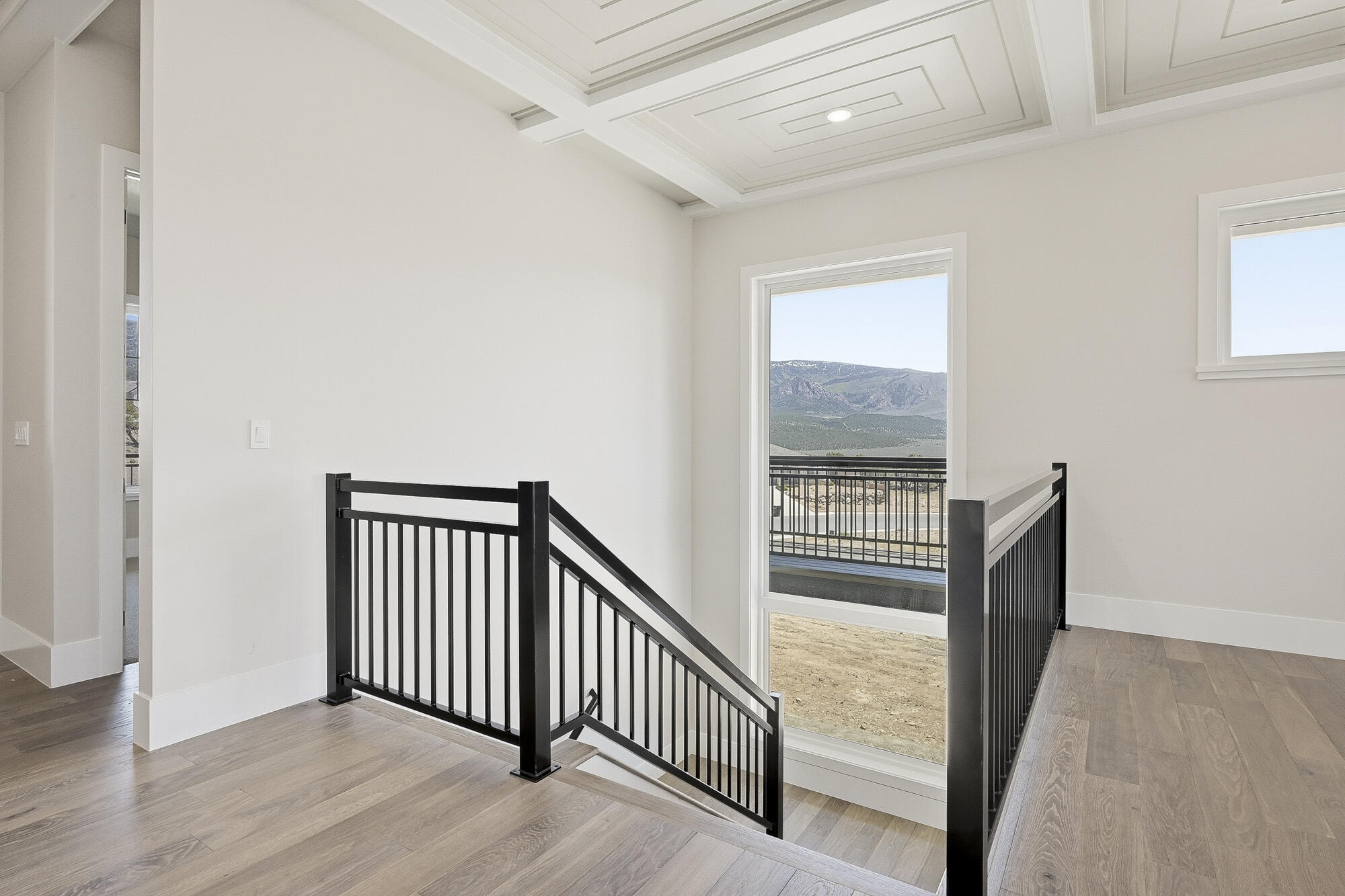 1852 South Hidden Canyon Road Cedar City, UT 84720 - Photo 41 of 79 A bright, open stairwell helps connect the home’s two levels.