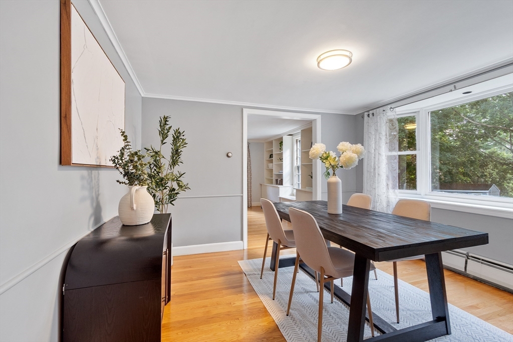 26 Wing Road Lynnfield, MA 01940 - Photo 16 of 39 a dining room with furniture and window