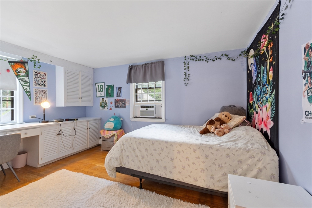 26 Wing Road Lynnfield, MA 01940 - Photo 28 of 39 a bedroom with a bed and a desk