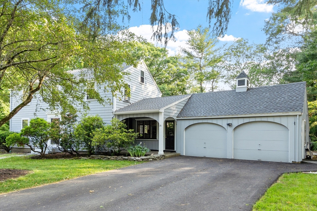 26 Wing Road Lynnfield, MA 01940 - Photo 3 of 39 a house view with a garden space