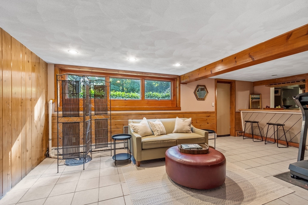 26 Wing Road Lynnfield, MA 01940 - Photo 35 of 39 a living room with furniture and a large window