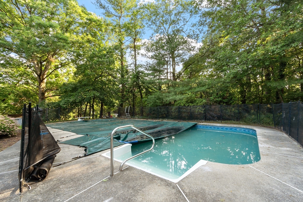 26 Wing Road Lynnfield, MA 01940 - Photo 37 of 39 a view of a swimming pool from a outdoor space