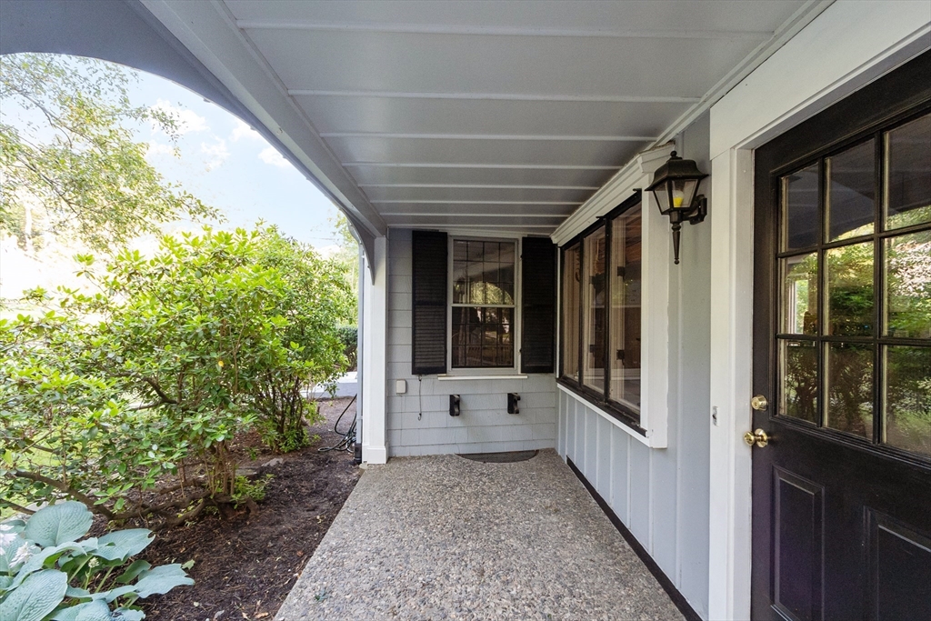 26 Wing Road Lynnfield, MA 01940 - Photo 5 of 39 a view of a porch
