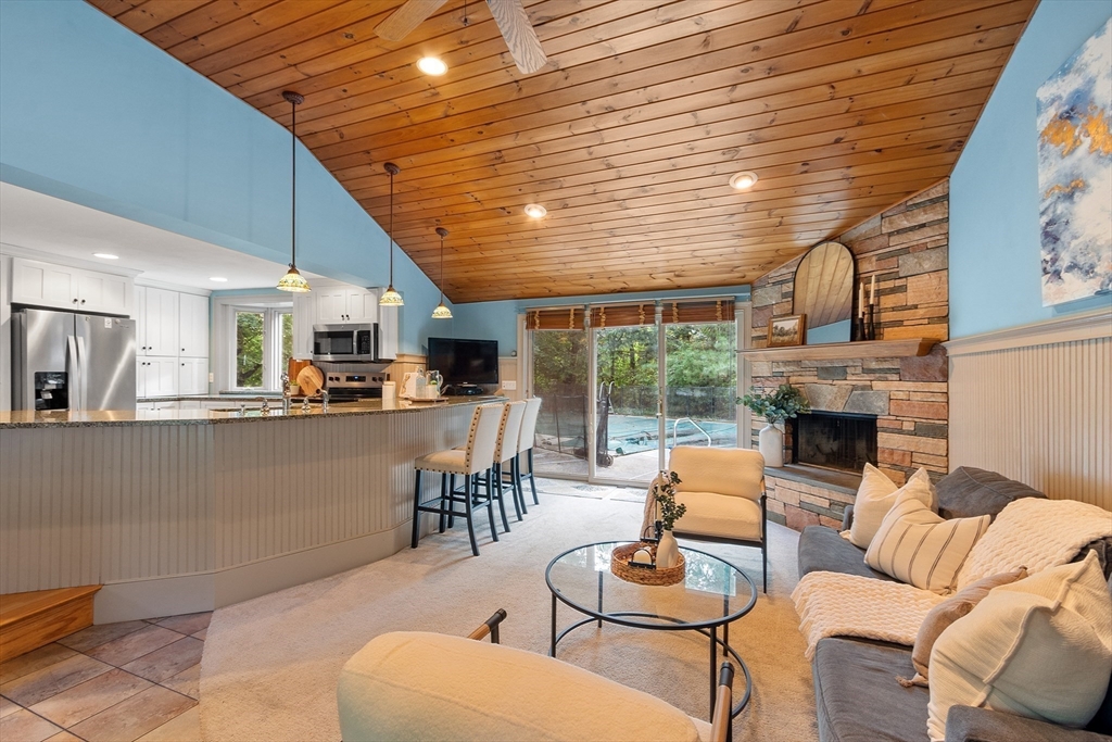 26 Wing Road Lynnfield, MA 01940 - Photo 6 of 39 a living room with furniture and fireplace