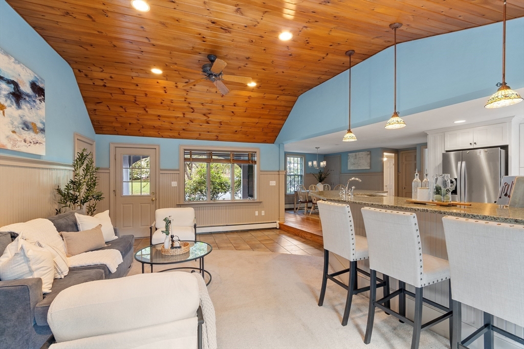 26 Wing Road Lynnfield, MA 01940 - Photo 7 of 39 a view of a dining room with furniture