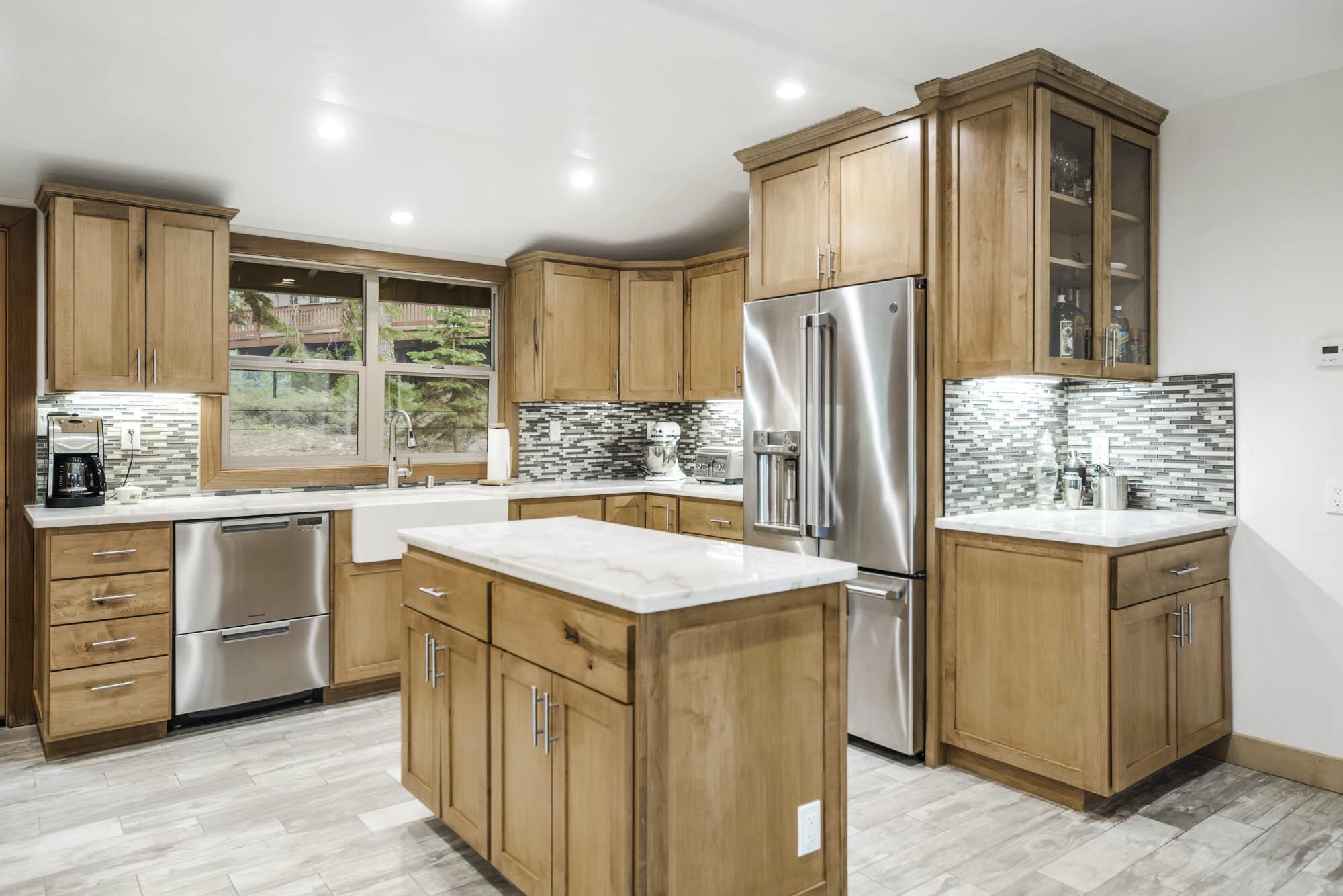 375 Ellis Road Homewood, CA 96141 - Photo 4 of 21 a kitchen with stainless steel appliances granite countertop a sink stove and refrigerator