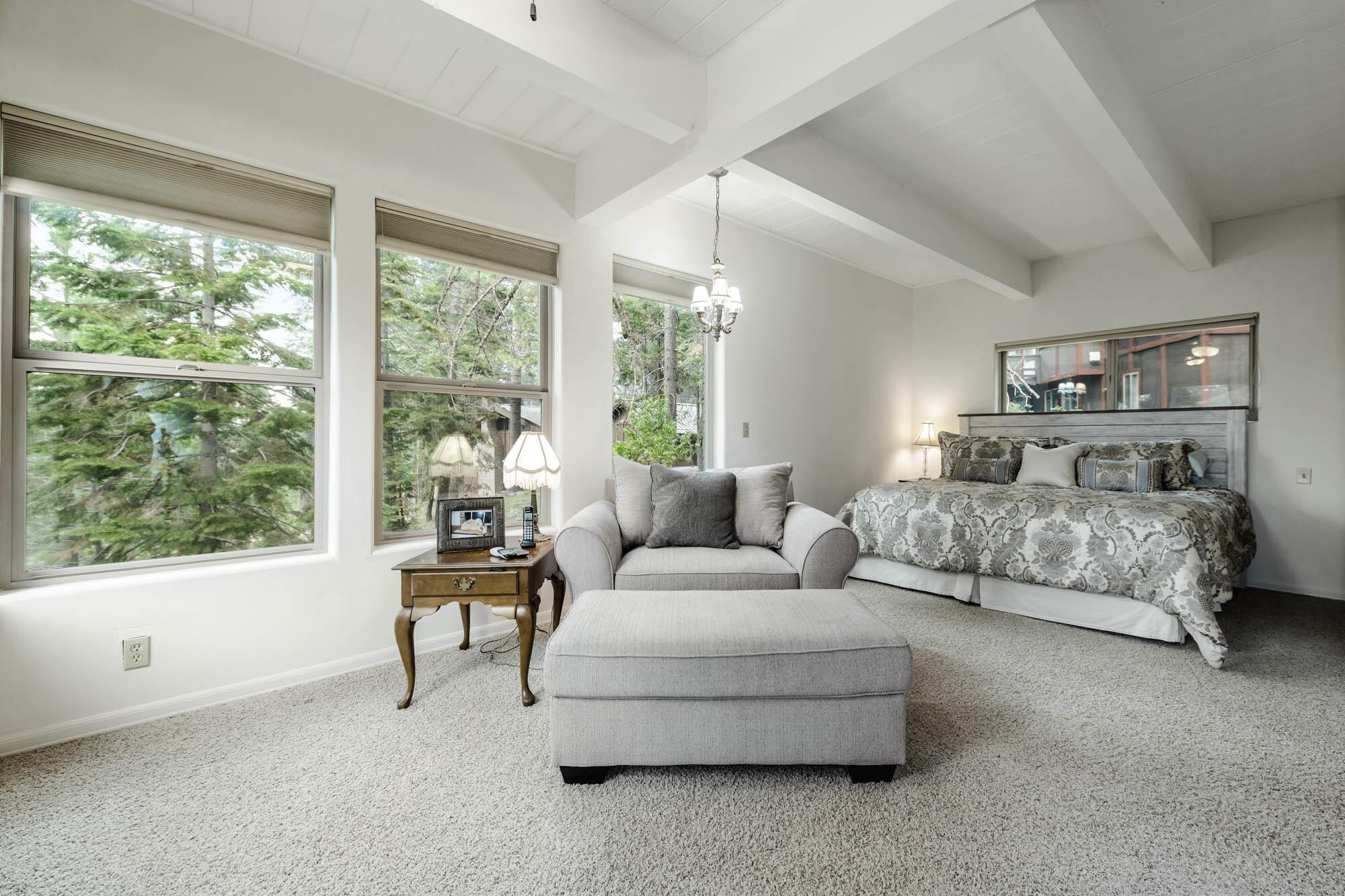 375 Ellis Road Homewood, CA 96141 - Photo 5 of 21 a bedroom with furniture and large windows