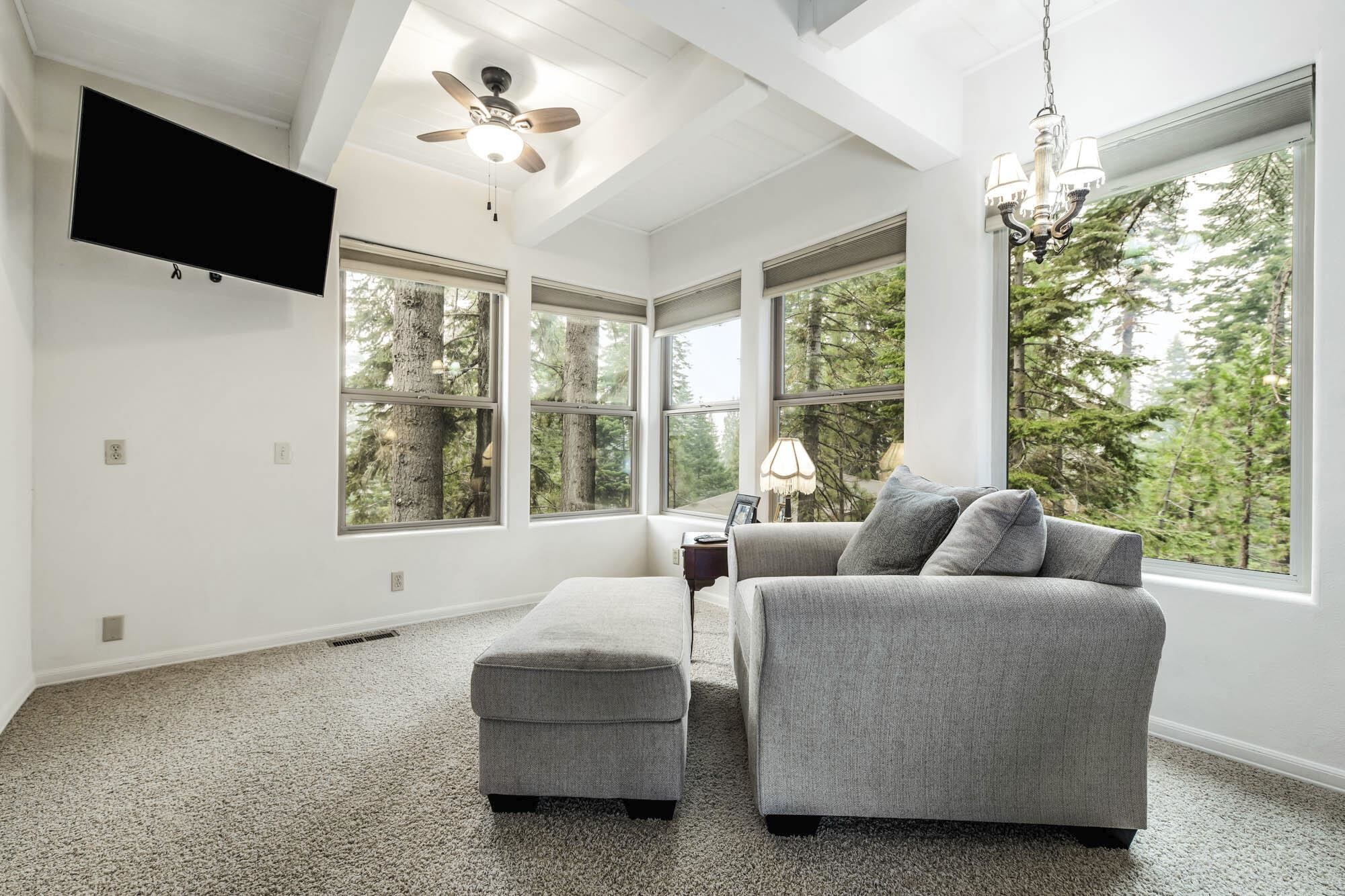 375 Ellis Road Homewood, CA 96141 - Photo 6 of 21 a living room with furniture and a large window