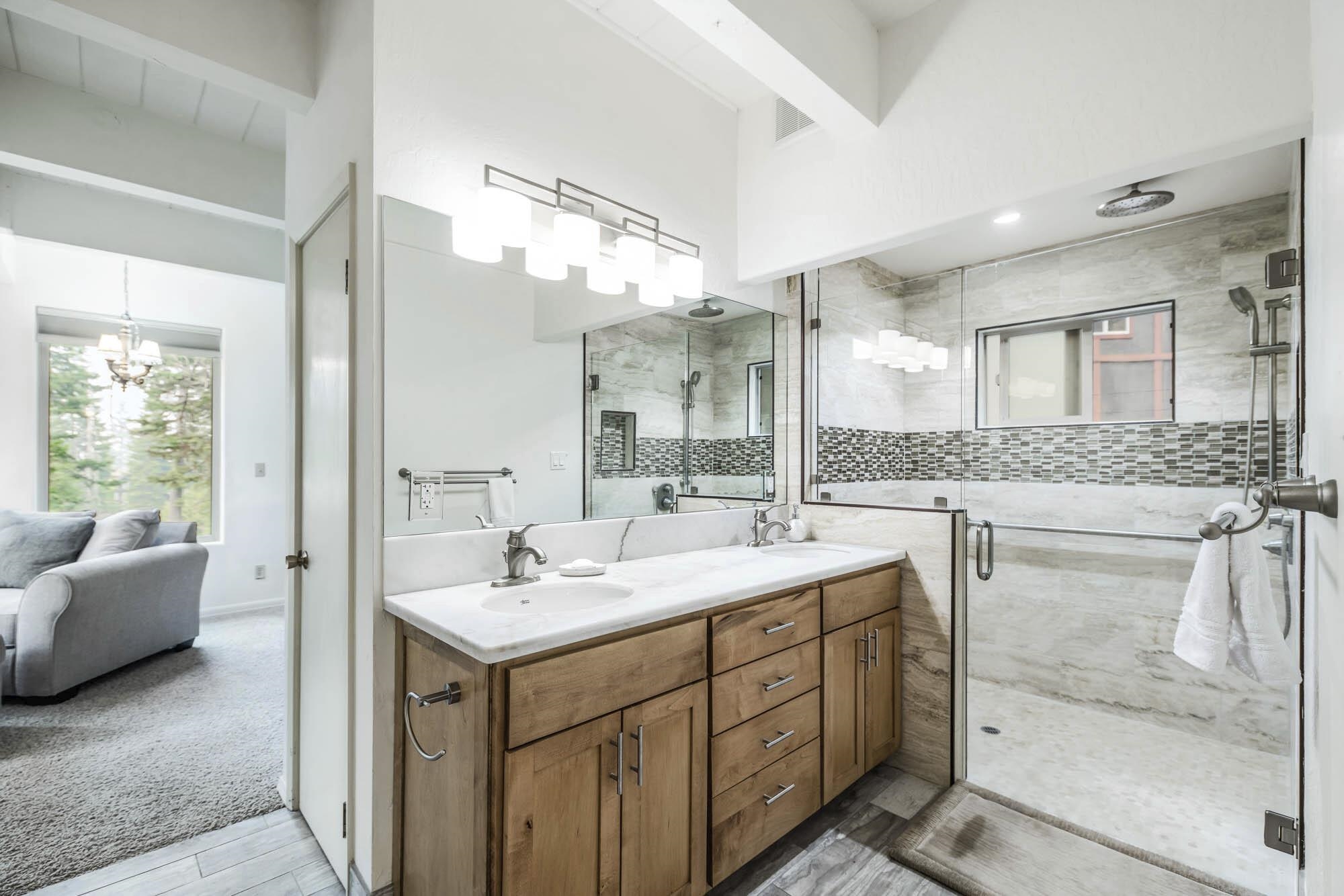 375 Ellis Road Homewood, CA 96141 - Photo 7 of 21 a bathroom with a sink double vanity mirror and a bathtub