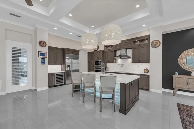 a bedroom with a bed and a flat tv screen