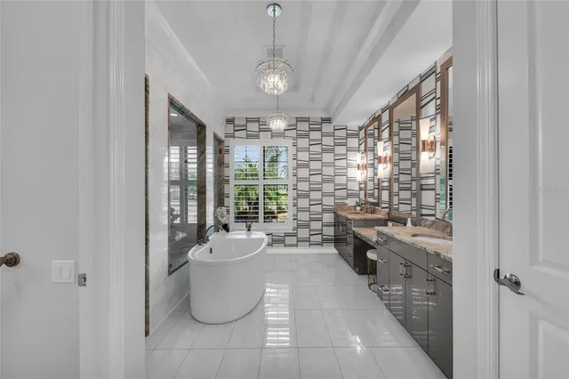 a kitchen with stainless steel appliances a sink stove and cabinets
