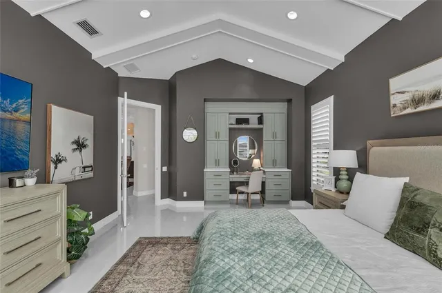 a front view of a house with a yard table and chairs