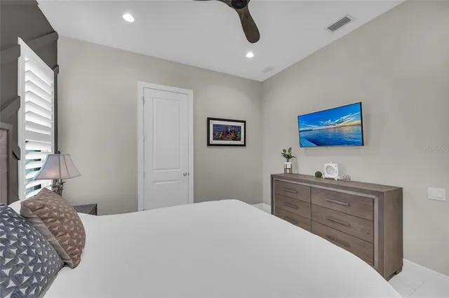 an aerial view of a house with a lake view