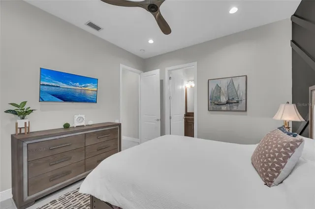 an aerial view of a house with a lake view