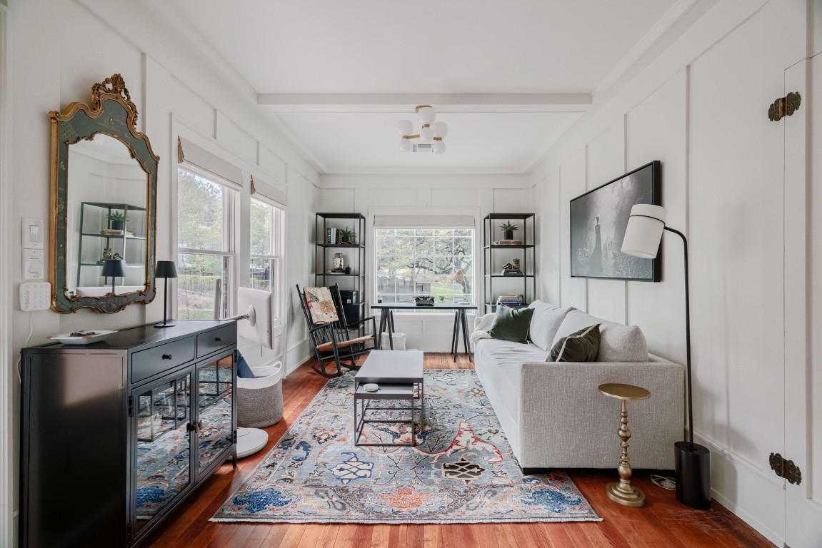 904 Avondale Road Austin, TX 78704 - Photo 4 of 16 a living room with furniture wooden floor and a chandelier