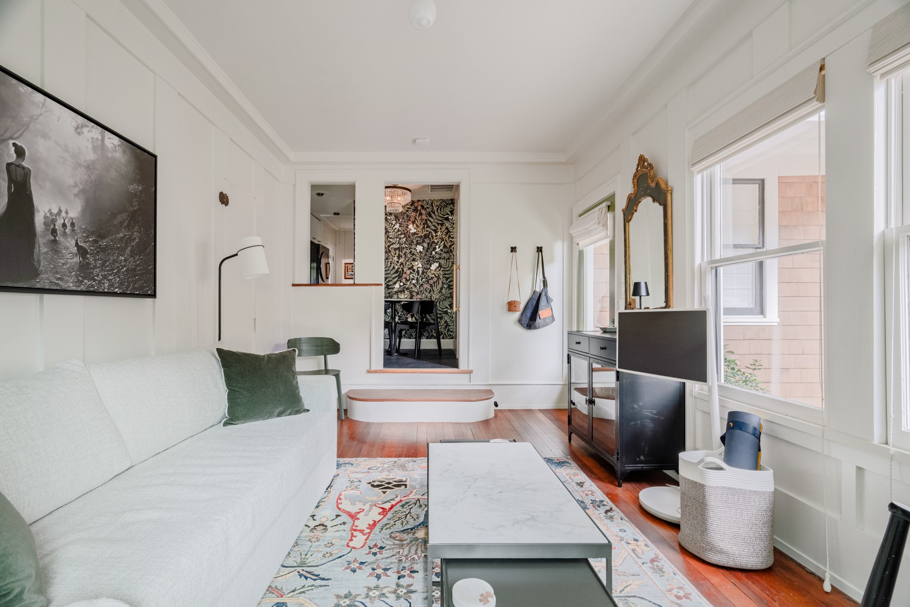 904 Avondale Road Austin, TX 78704 - Photo 7 of 16 a living room with furniture a large window and a flat screen tv