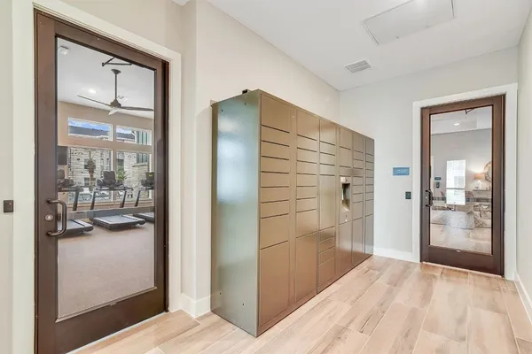 a view of a room that has a bed in it