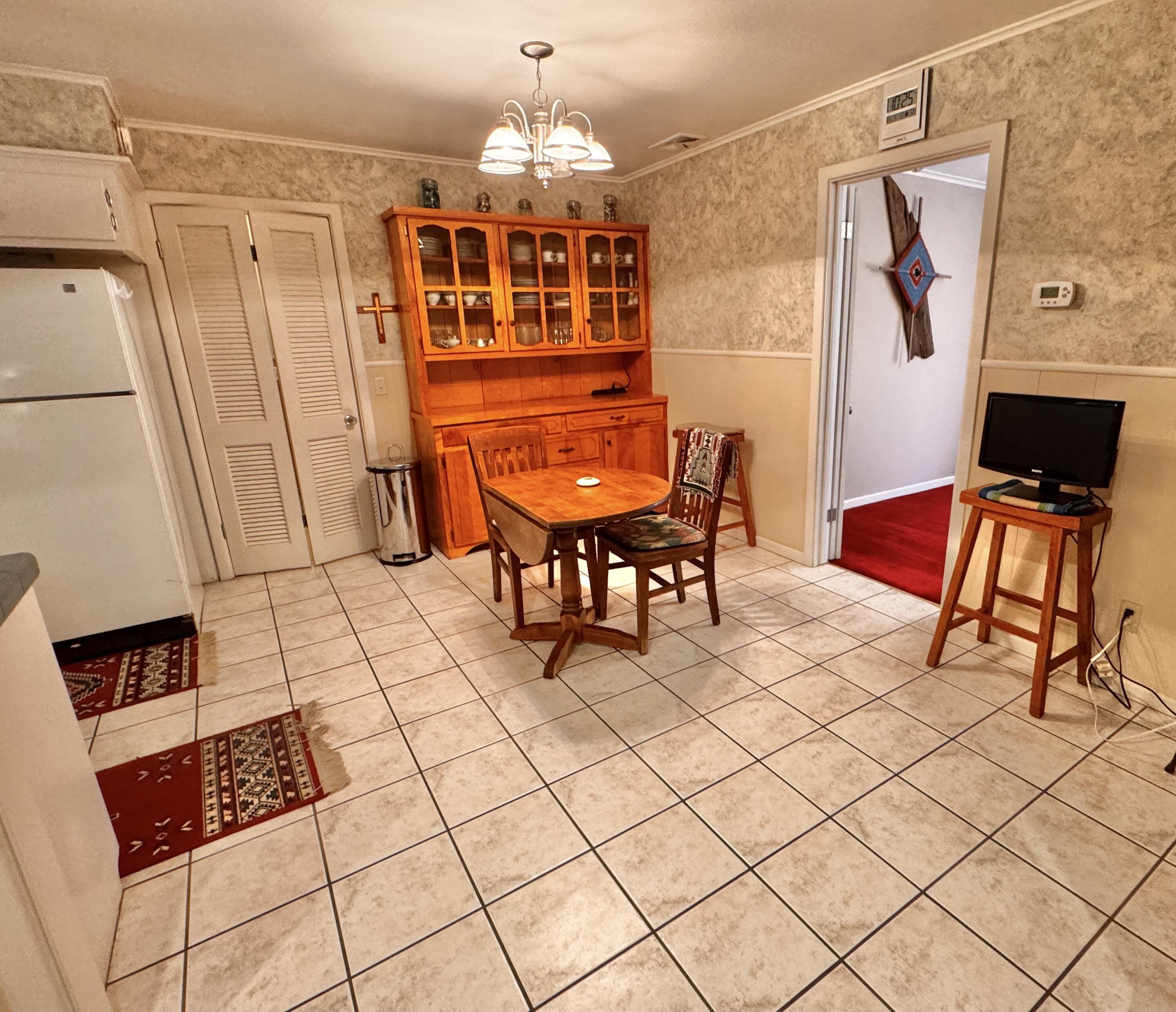 1403 Amarillo Plainview, TX 79072 - Photo 12 of 48 a view of a livingroom with furniture a flat screen tv and couches
