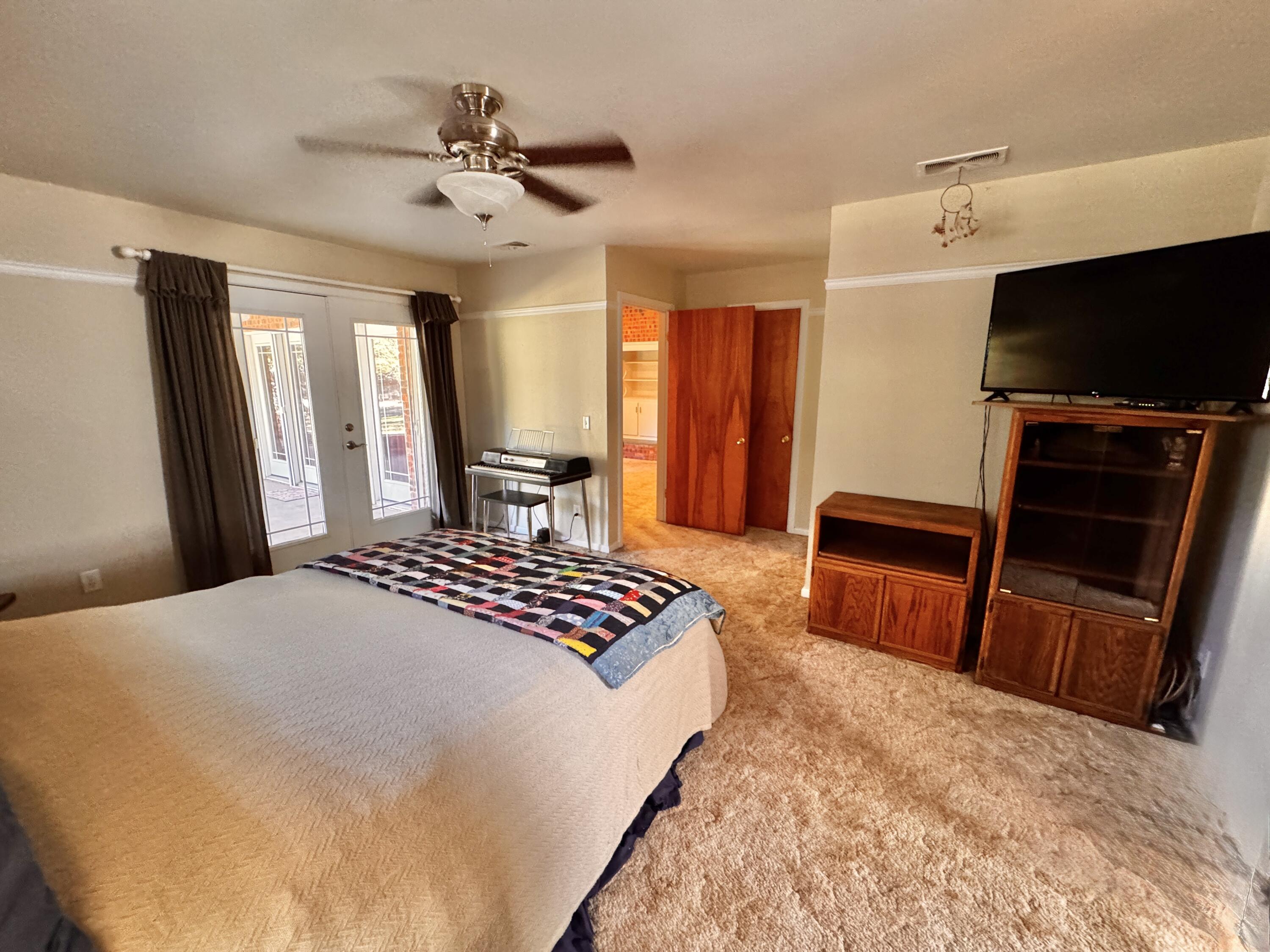 1403 Amarillo Plainview, TX 79072 - Photo 28 of 48 a bedroom with a bed and furniture