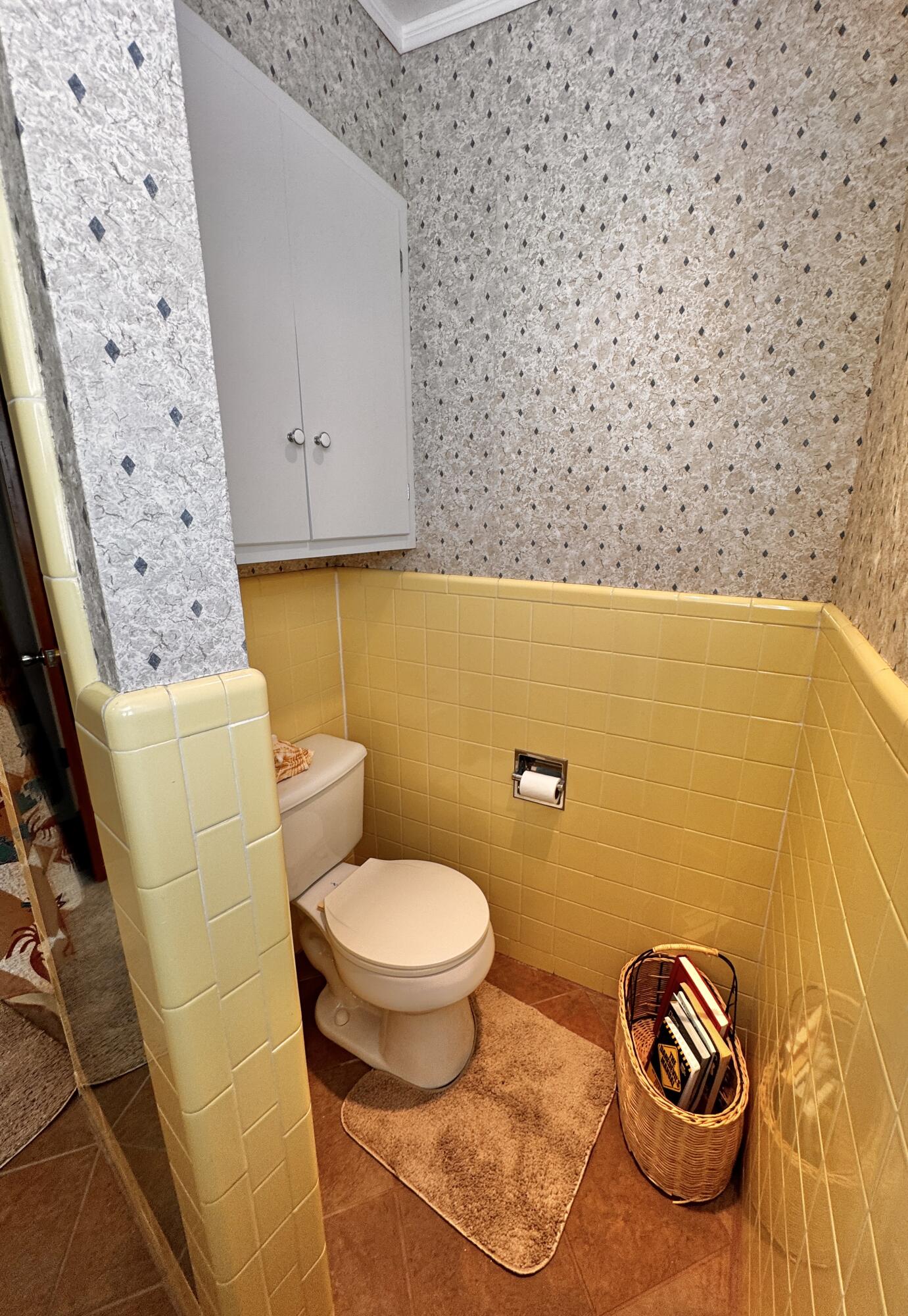 1403 Amarillo Plainview, TX 79072 - Photo 35 of 48 a bathroom with a toilet and a shower curtain