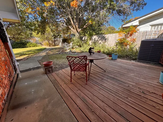 a view of yard with swimming pool