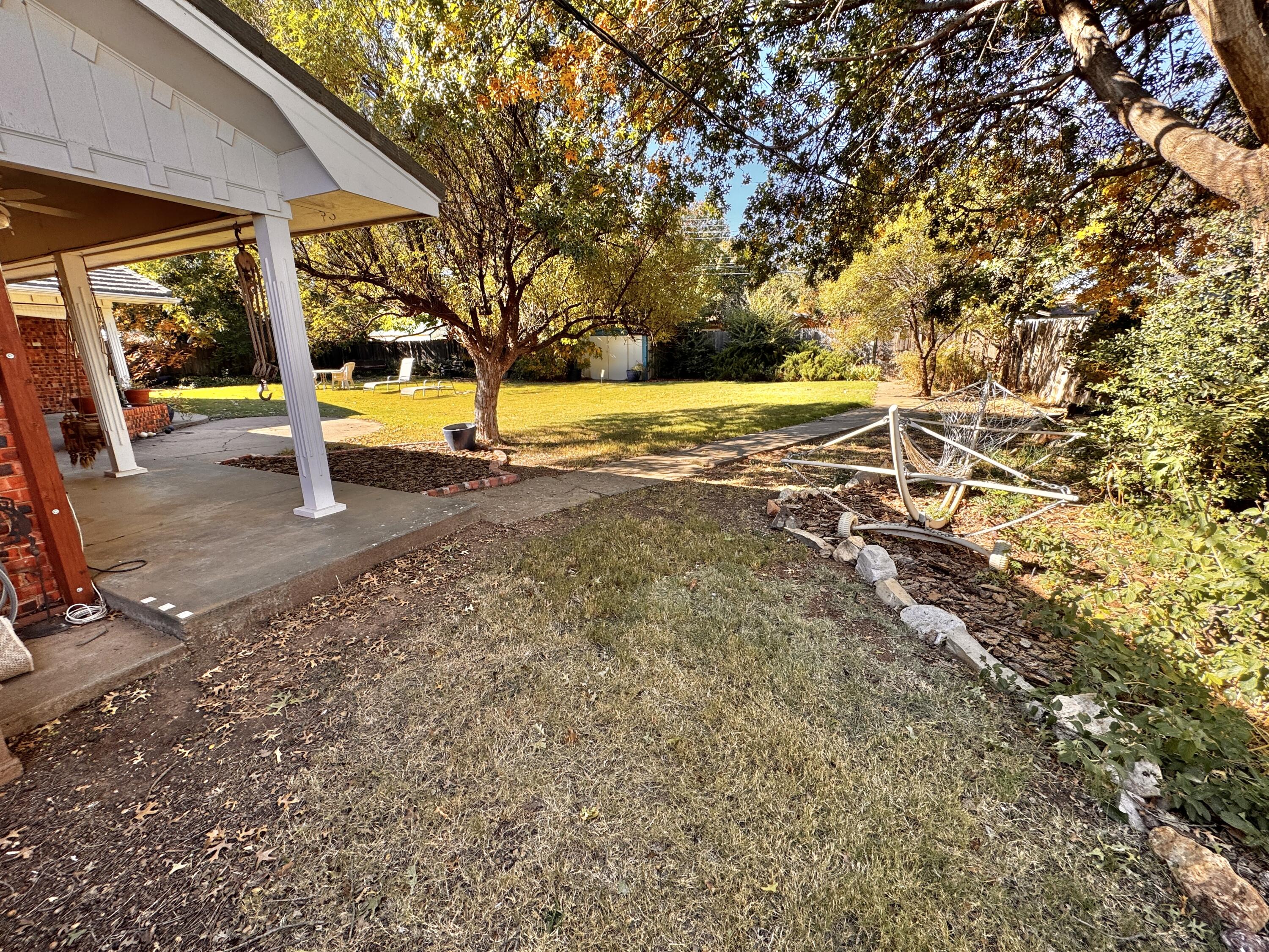 1403 Amarillo Plainview, TX 79072 - Photo 40 of 48 a view of yard with swimming pool
