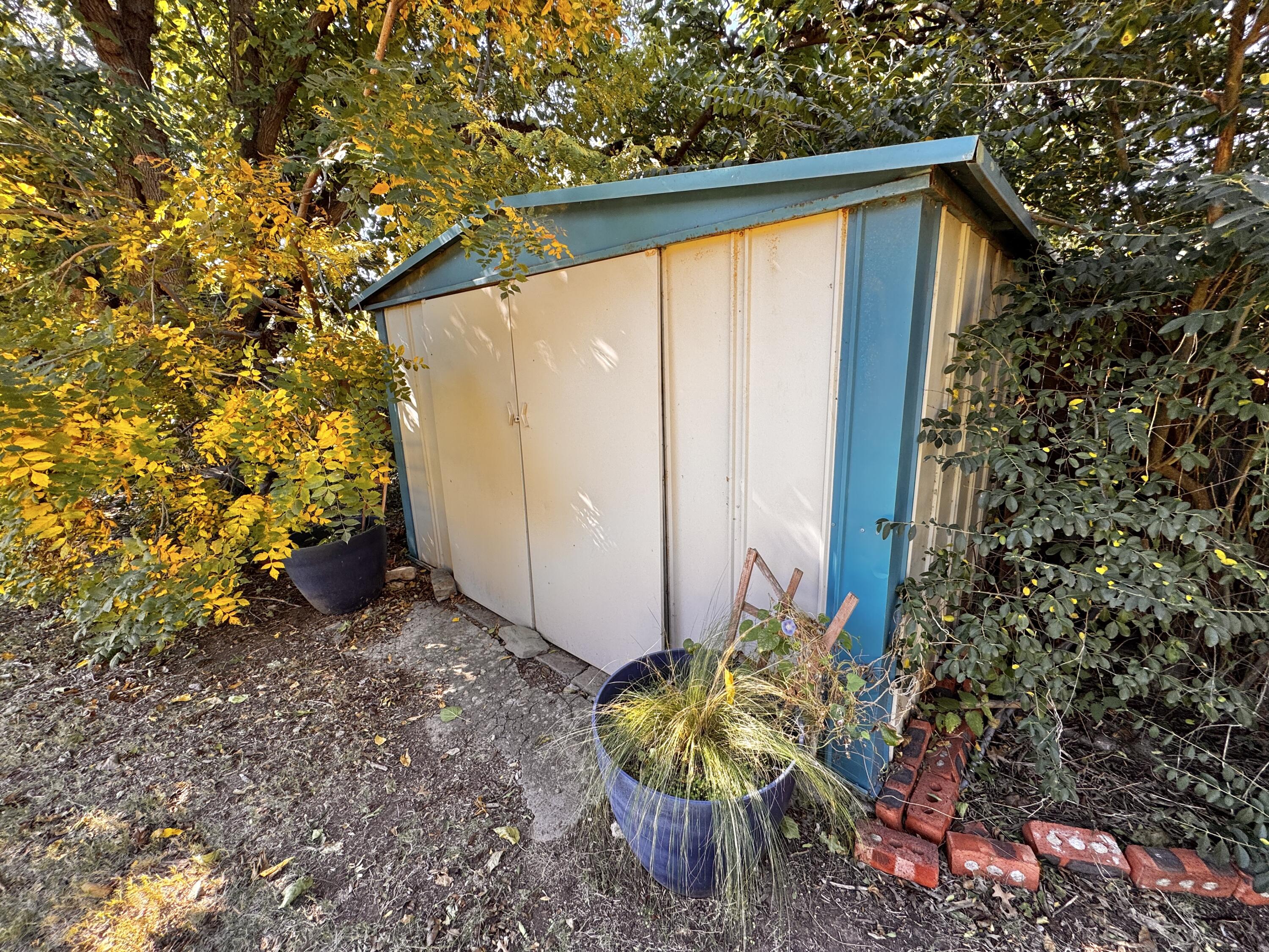1403 Amarillo Plainview, TX 79072 - Photo 47 of 48 a view of a back yard with plants
