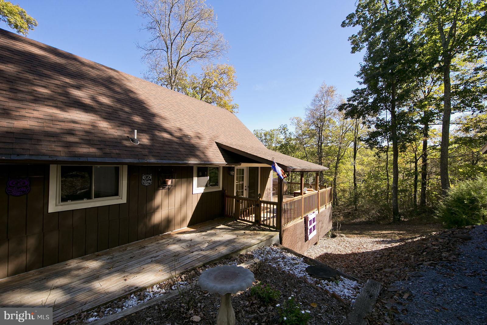 496 Audubon Road Hedgesville, WV 25427 - Photo 23 of 30 a view of a house with a yard