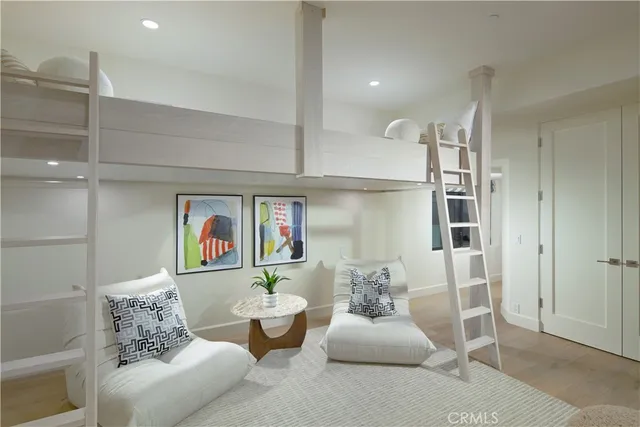 a view of a chairs and table in backyard