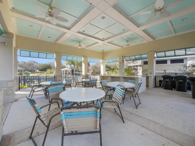 a view of a lake with houses in the back