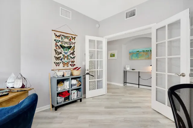 a view of a livingroom with furniture and toys