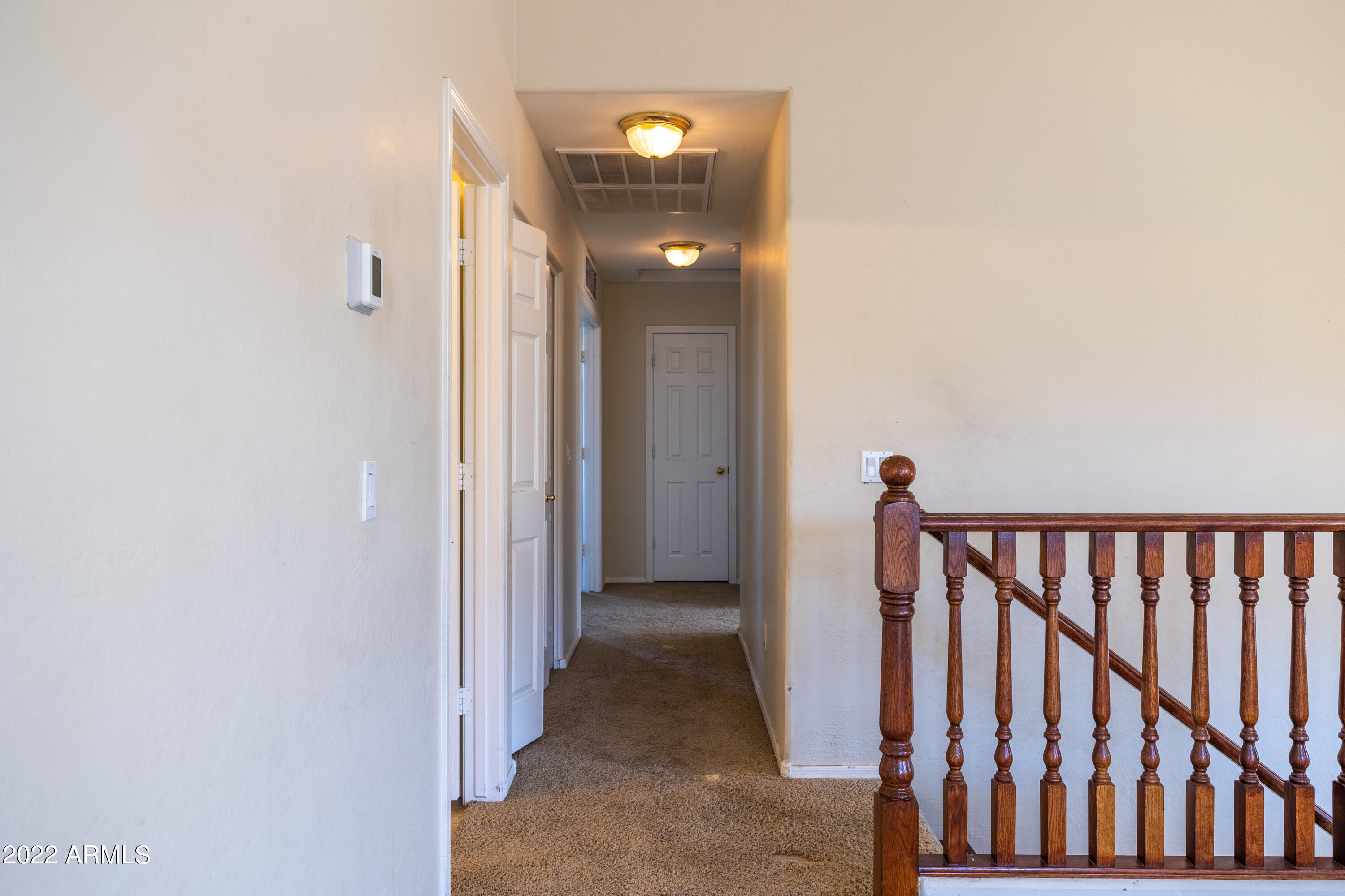 3233 West Pecan Road Phoenix, AZ 85041 - Photo 19 of 35 Upstairs Hallway