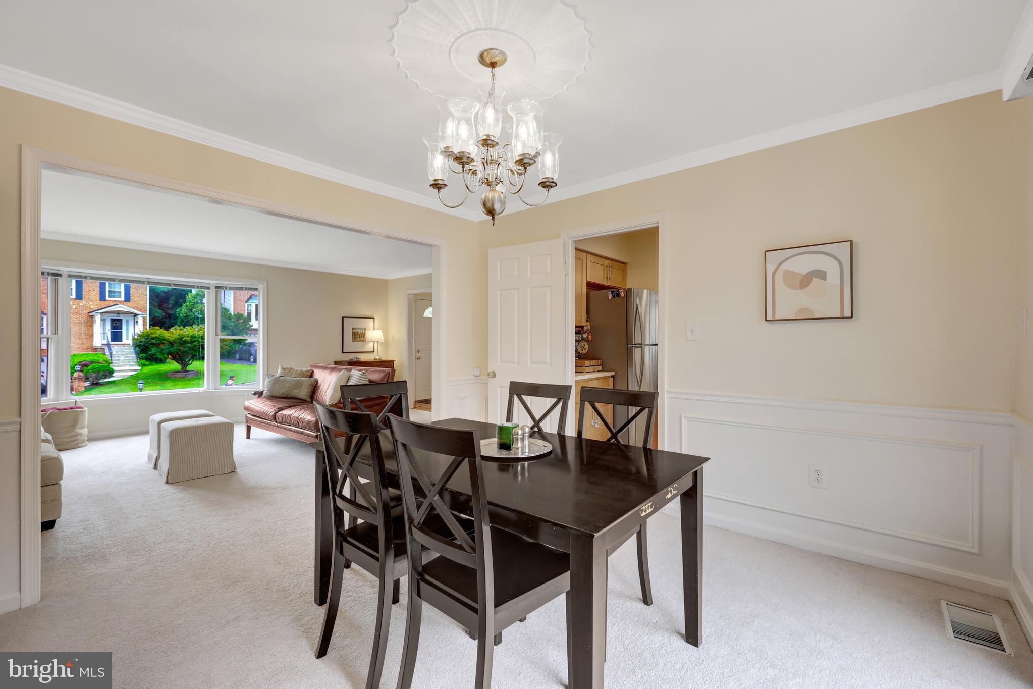 6868 Chelsea Road McLean, VA 22101 - Photo 16 of 41 a view of a dining room with furniture window and outside view