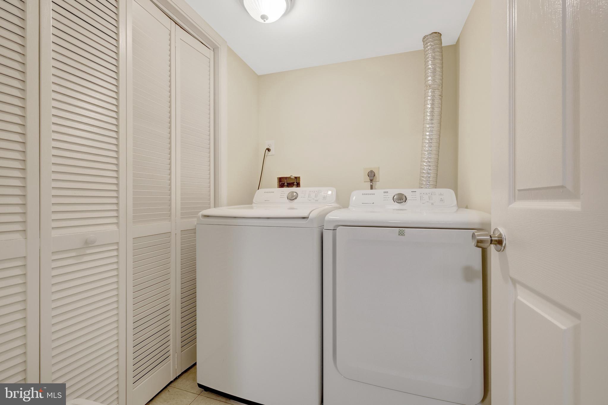 6868 Chelsea Road McLean, VA 22101 - Photo 34 of 41 a utility room with dryer and washer