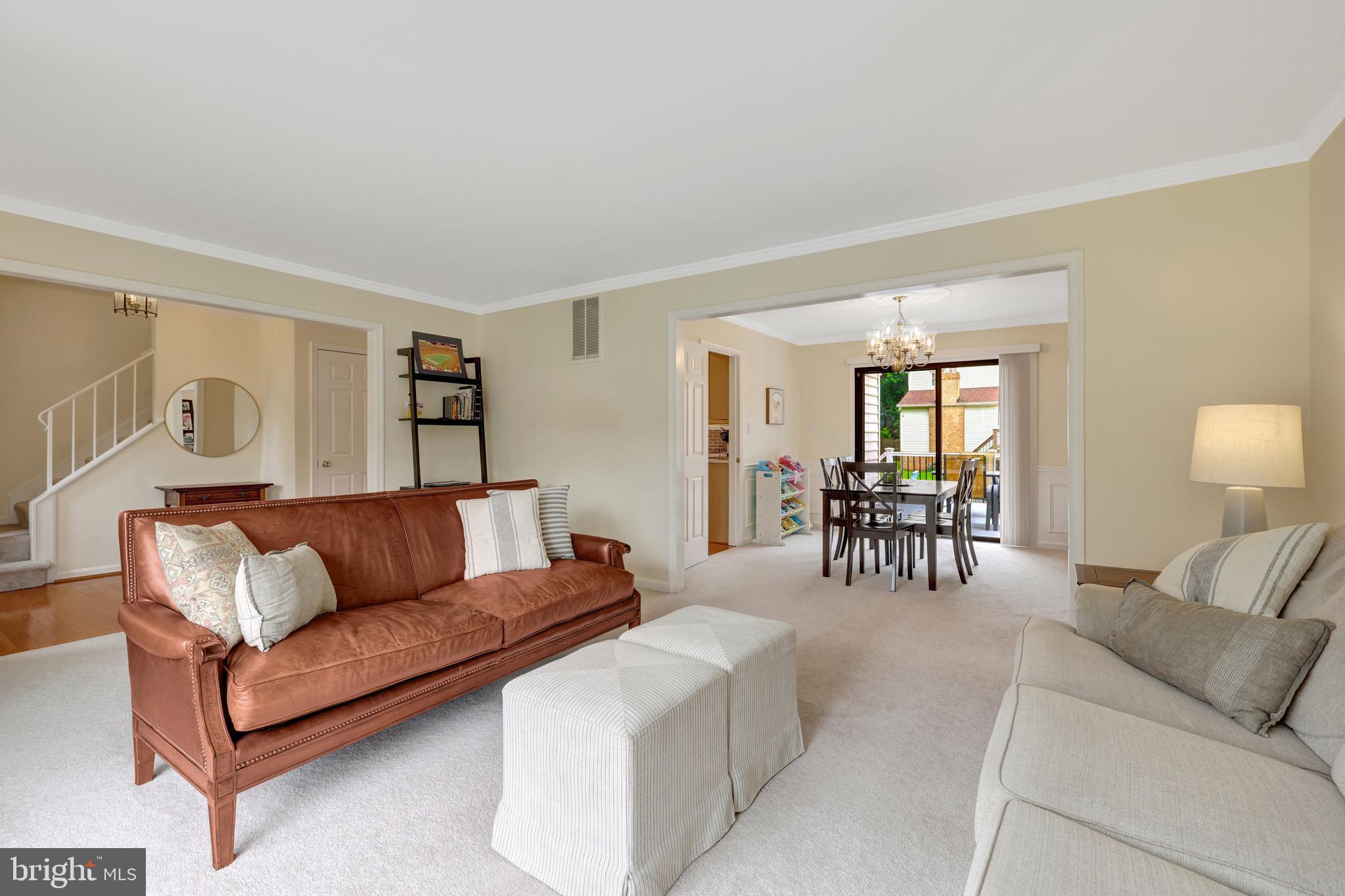 6868 Chelsea Road McLean, VA 22101 - Photo 8 of 41 a living room with furniture and a wooden floor