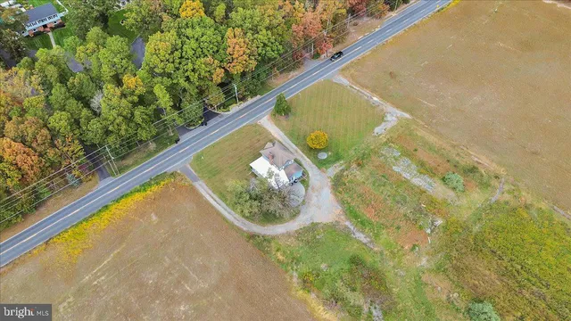 a view of a yard with a swimming pool
