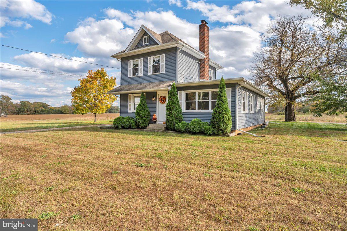 128 Cedarbrook Road Sicklerville, NJ 08081 - Photo 3 of 33 a front view of a house with a yard and trees