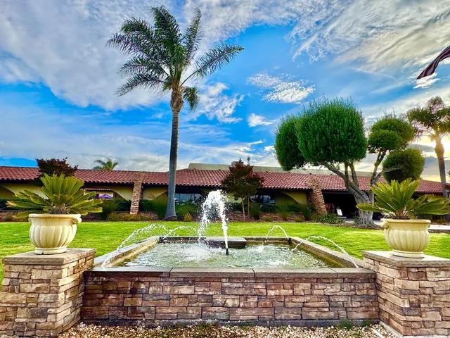a view of a swimming pool with a patio