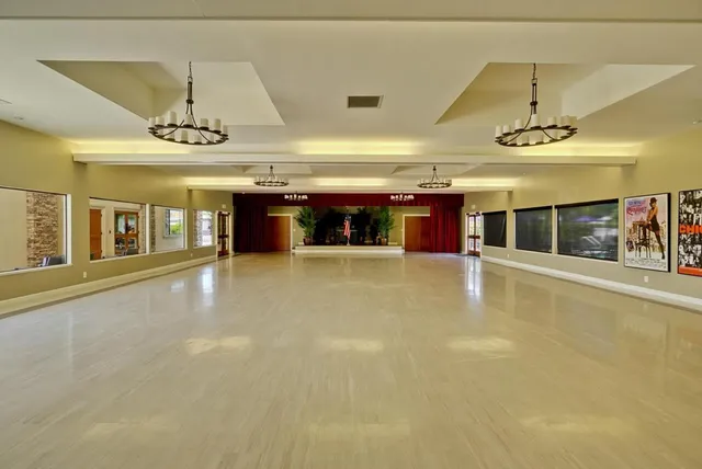 a swimming pool with a large window